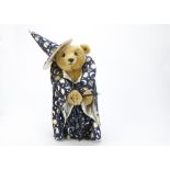 A yellow tagged Steiff Teddy Bear dressed as a wizard, made for an exhibition, not by Steiff, in