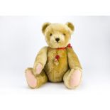 A large Hermann Limited Edition teddy bear, 338 of 500 with red plastic tag and tag certificate -