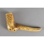 A 17th Century carved bone cane handle, with Latin inscription of L form dated 1630, 11 cm