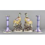 A pair of 19th Century Staffordshire candlesticks, mauve and gilt, one af, 21 cm high together