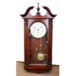 A reproduction American cased wall clock, with Westminster chime, movement marked Sligh, 78 cm high