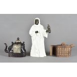 A Minton figure of The Sheikh, in pottery and bronzed metal and two Asian teapots