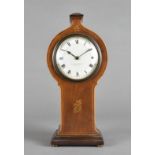 A mahogany and satin strung mantel clock, with French drum movement, white enamel face, roman