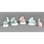 A small collection of Herend porcelain animal figurines, including a pair of rabbits, a duck etc