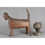 Two carved African mythical beasts, the wooden carved figures modelled as a flightless bird and