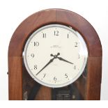 An early 20th Century Smiths electric regulator clock, white face with Arabic numerals, in a