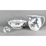 An Art Deco Staffordshire jug and basin set, transfer printed in colours