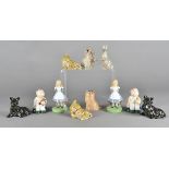 A collection of miscellaneous Wade figurines, including brown spaniel dog, grey haired rabbit, two