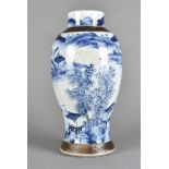 A 19th Century Chinese blue and white baluster vase, with bronzed panels, four character mark to