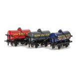 An ACE Trains O Gauge 3-wagon Tanker Set No 5, including red 'Shell', blue 'Redline-Glico' and