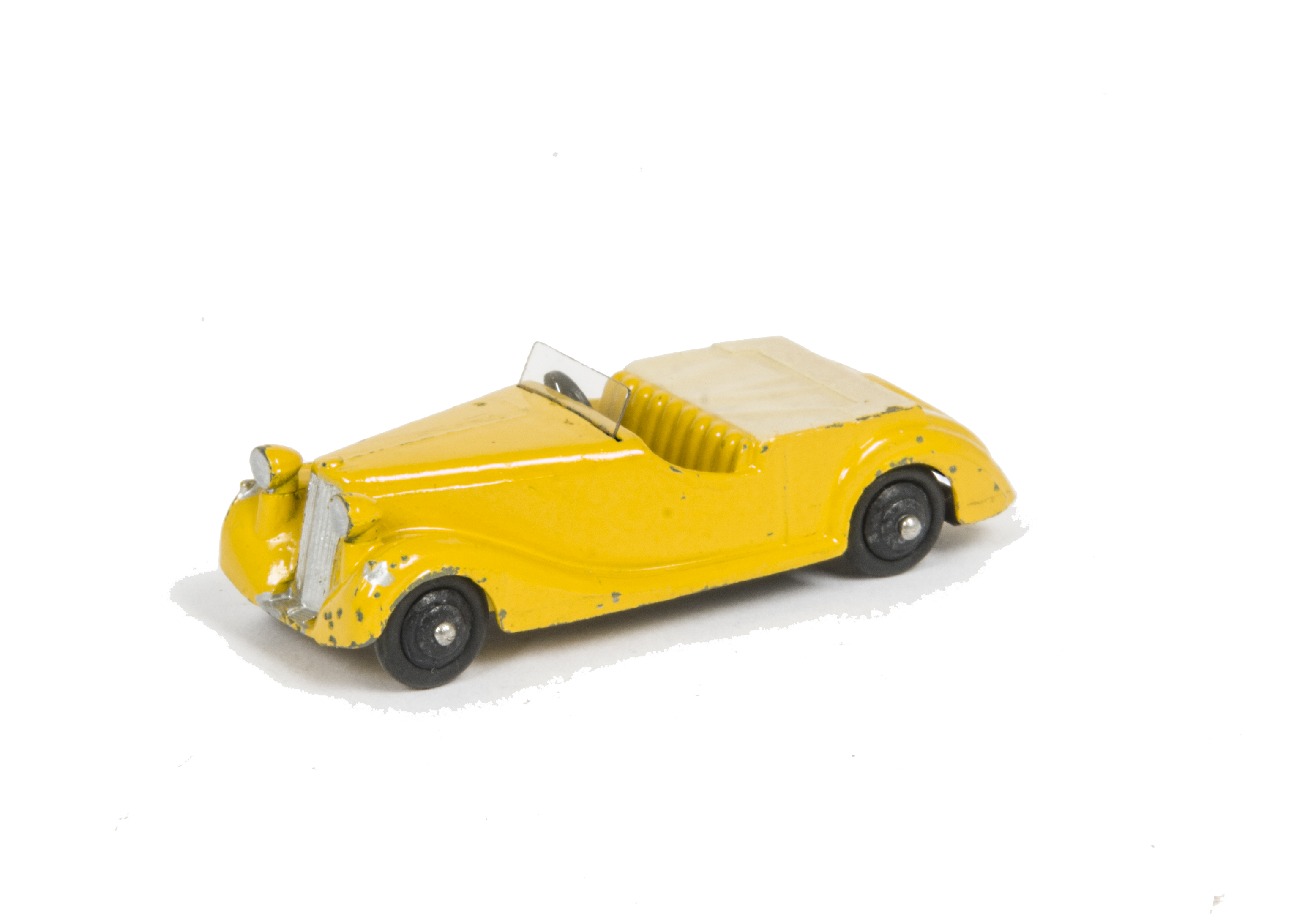 A Dinky Toys 38b Sunbeam Talbot Sports, yellow body, ivory tonneau, black ridged hubs, G