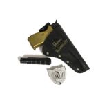 A Lone Star James Bond 007 9mm automatic Gun, with gold plastic grip, silencer, and holster with