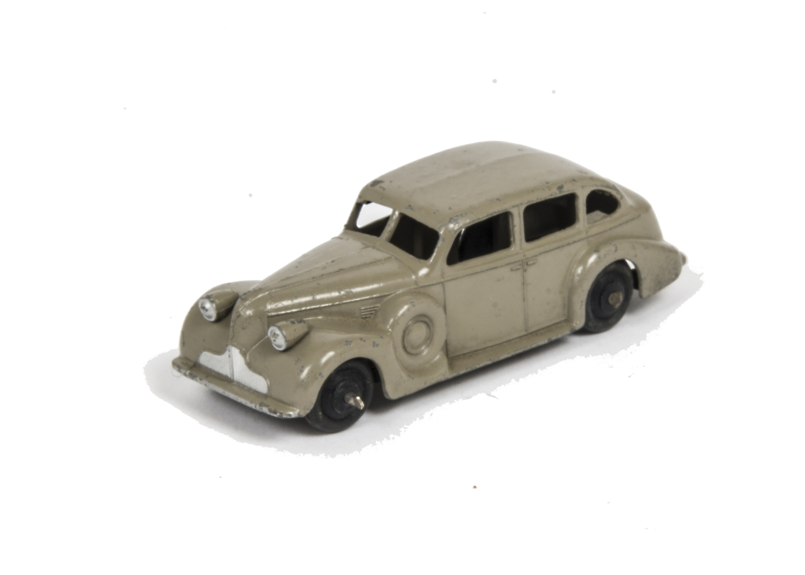 A Dinky Toys 39d Buick Viceroy Saloon, fawn body, black ridged hubs, G-VG