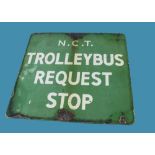 A rare vintage enamel N.C.T Trolleybus Request Stop sign, square double sided in green with white