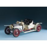 A Mamod steam roadster, the live steam car in good condition, seat loose, with box, tatty but