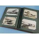 A good collection of early 20th century aviation postcards, approx 200 presented in a red album,