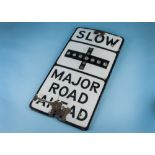 A vintage enamel Catseye road sign, stating Slow, and, Major Road Ahead, AF, 67cm by 36cm