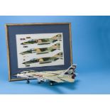 A framed set of three watercolour paintings of a Phantom USAF fighter plane, together with a plastic