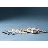 A collection of diecast and other waterline ships and boats, with examples by Mercator, Tri-ang
