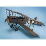 A kitbuilt model of a WWI RFC bi-plane, painted brown with B502 to tail fin, damages and AF, 100cm