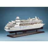 A c1970s travel agency model of a cruise liner, "Majesty of the Seas", presented on a wooden