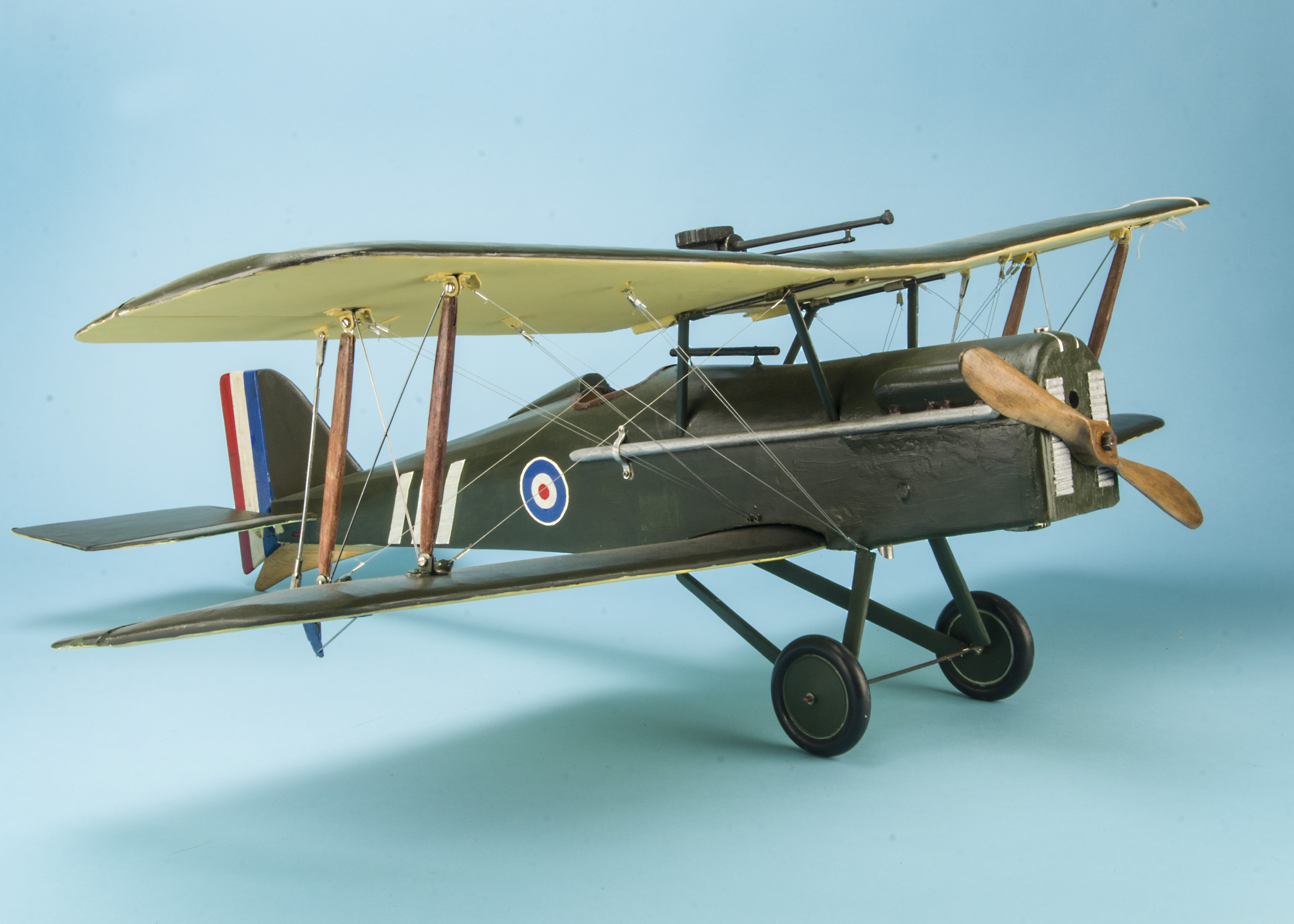 A detailed scratch built flying scale model of a WWI SE5a fighter biplane, recently refreshed colour