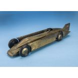 Segrave's "Golden Arrow" Tinplate toy record-car c1929; An original period tinplate clockwork toy