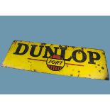 A large vintage enamel Dunlop advertising sign, in yellow black and red and stating "Dunlop Fort",