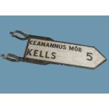 A vintage Irish road sign, double sided arrow with clamps, stating "Ceanannus Mor Kells 5", 29cm