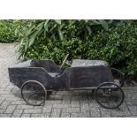 An early 20th century French child's pedal car modelled on a Renault racer c1920s, painted wooden