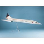 A large travel agency fibreglass model of Concorde, in British Airways livery, on chromed stand,