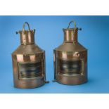 A good pair of early 20th century copper and brass shipping lamps by Bow, one port, the other