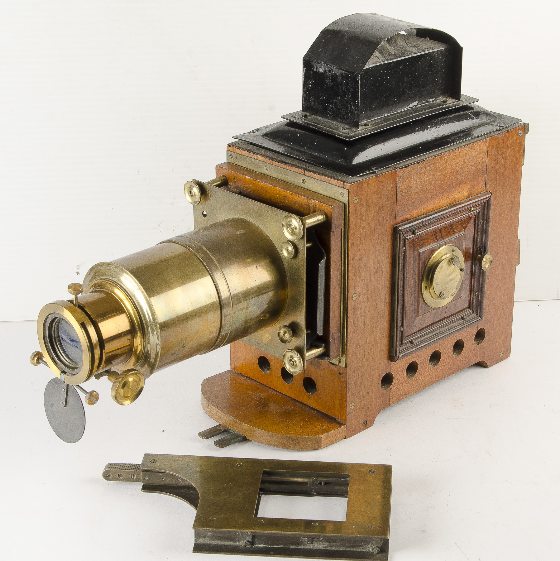 A mahogany and brass Magic Lantern, lacks illuminant, F, altered, chimney repainted, with live