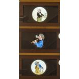 Four Mahogany-Framed Hand-Coloured Magic Lantern Slipping Slides of Musical Interest, Including a