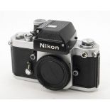 A Nikon F2 Photomic SLR Body, serial no. 7126388, chrome, shutter working, DP-1 photomic head,