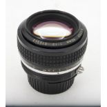 A Nikon Nikkor 50mm f/1.2 Lens, serial no. 216363, AI, black and chrome, barrel, G, light marks to