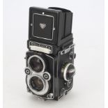 A Rolleiflex 3.5F 'White Face' TLR Camera, serial no. 2853377, type 4, shutter working, meter