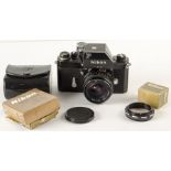 A Nikon F Photomic FTN SLR Camera, serial no. 7086974, black, shutter working, body, G, brassed,