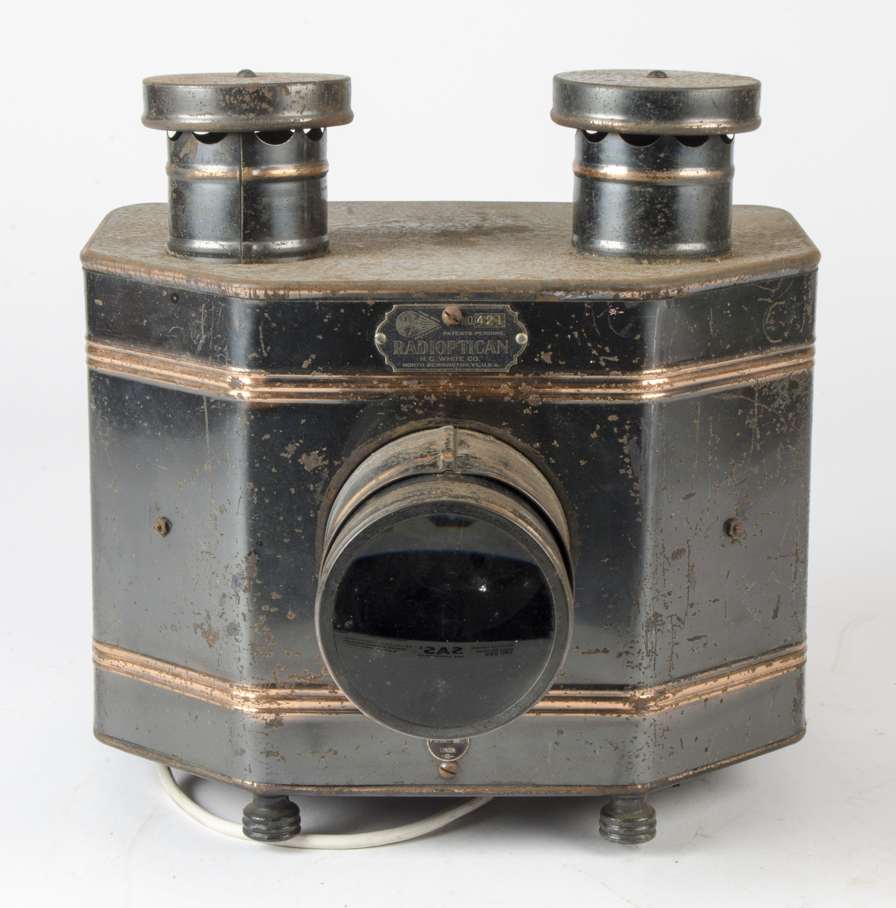 A Radioptican Mirrorscope Type Tin Postcard Projector, Manufactured by HC White Co.with lens,