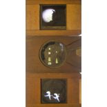 Twelve Miscellaneous Mahogany Framed Hand-Coloured Dissolve Effect Magic Lantern Slides,