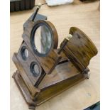 A 19th Century olive wood Graphoscope, 330mm long, with Underwood & Underwood stereo cards of