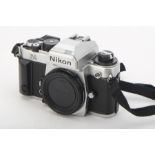 A Nikon FA SLR Body, serial no. 5037911, chrome, shutter working, body, G-VG, with maker's body