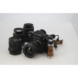 A Asahi Pentax 6X7 SLR Camera Oufit, serial no. 4108829, body G, wooden handle grip, with lenses;