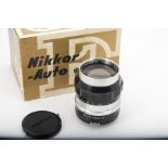 A Nikon Nikkor-P Auto 10.5cm f/2.5 Lens, serial no. 137974, black and chrome, barrel, VG,