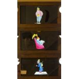 Six Mahogany-Framed Hand-Coloured Magic Lantern Double Slipping Slides, of a boy with geese, a man