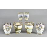 Three large Noritake porcelain vases, all with landscape decoration, heightened in gilt (6)