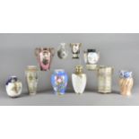 A collection of Noritake porcelain vases, all painted with flowers and landscapes, to include a an