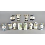 A collection of six twin handled Noritake vases, all painted with floral designs, and some