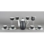 A Foley bone china six place coffee service, Domino pattern comprising six cups, saucers, sugar