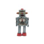 A Yonezawa (Japan) Clockwork Winky Robot, blue-grey tinplate robot, winking lenticular eyes, off-